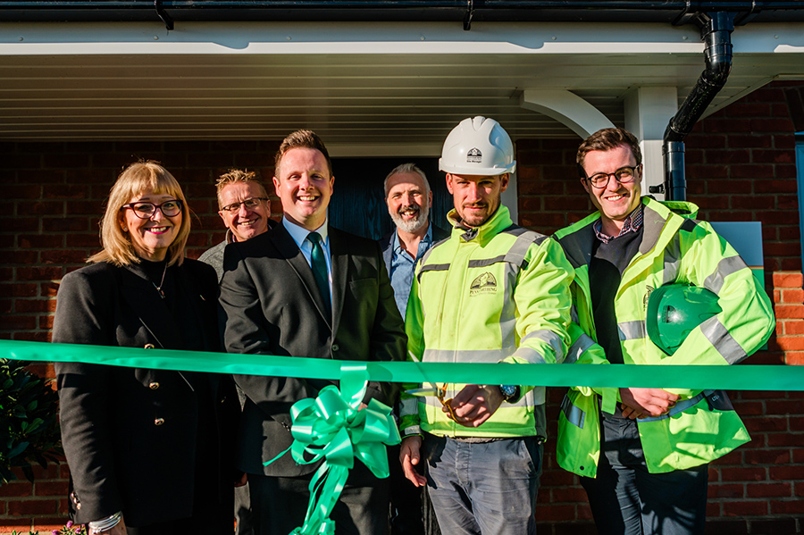 The Project Team officially open the show home at Whitsbury Green. Phil Langdon, Construction Manager ; Nick Stone, Land Manager; Jackie Smith, Sales Manager; Richard Stephens, Sales Executive ; Lewis Browne, Assistant Site Manager; Daniel Jones, Technical Co-Ordinator